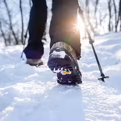 a person hiking in the snow