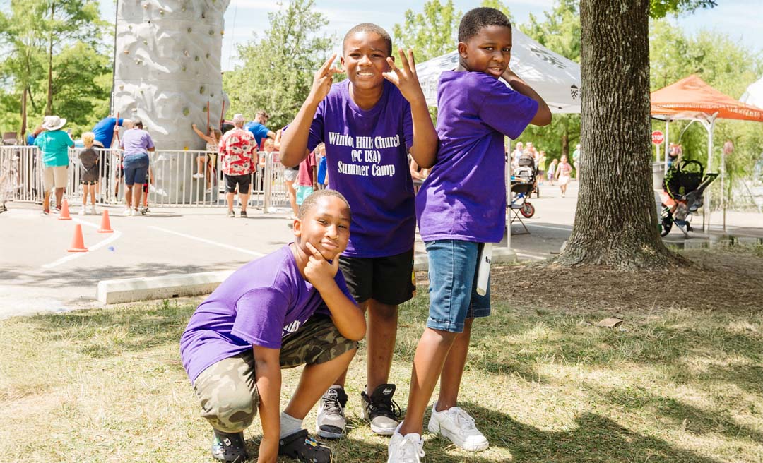 a group of boys posing for a picture