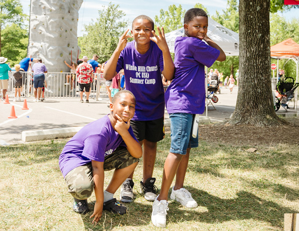 a group of boys posing for a picture