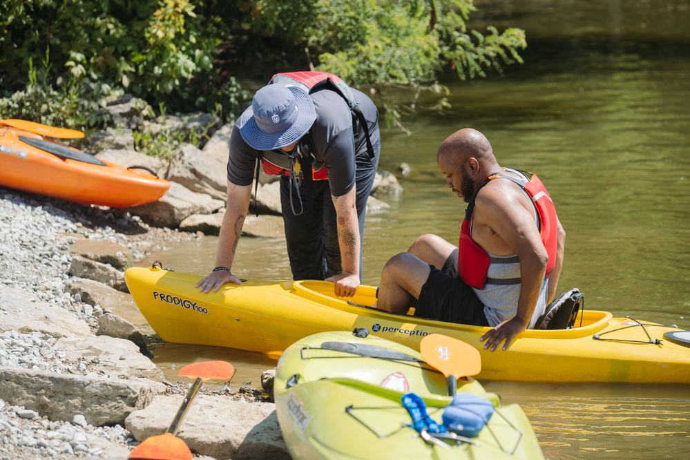 Instructor teaching paddling