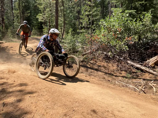 Mountain bikers on an apaptive trail