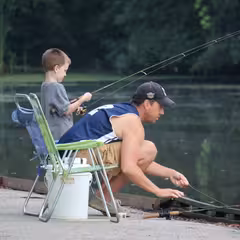 Father and son fishing together 
