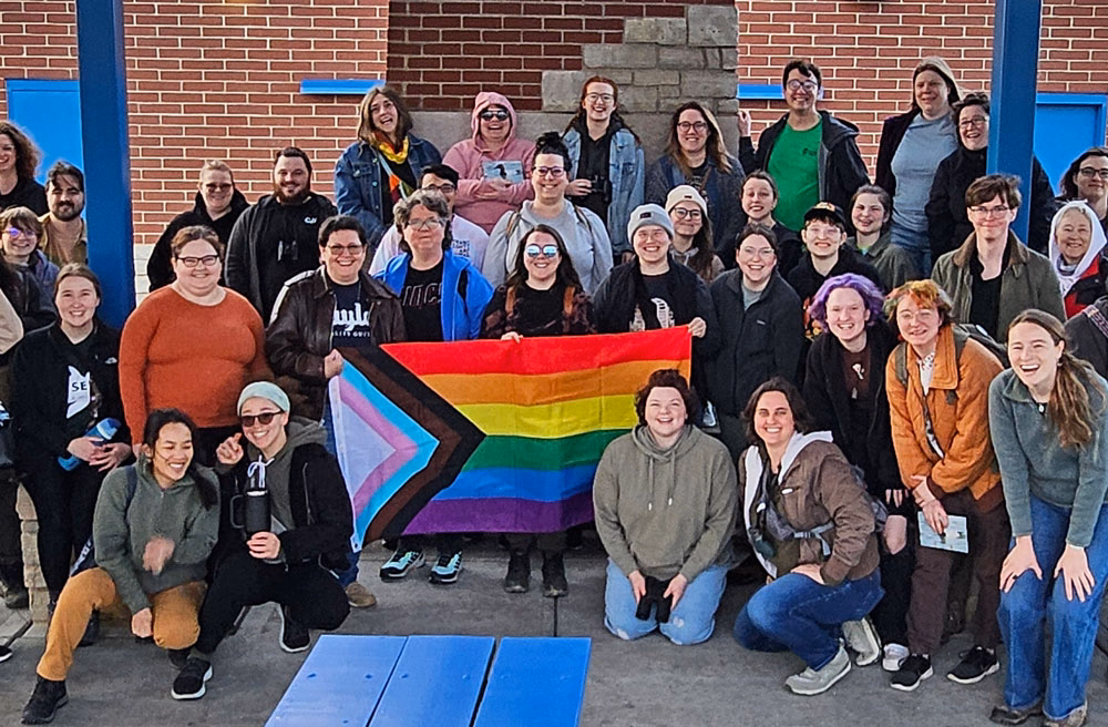 Pride flag with group